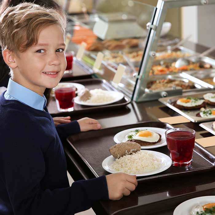 student with school lunch